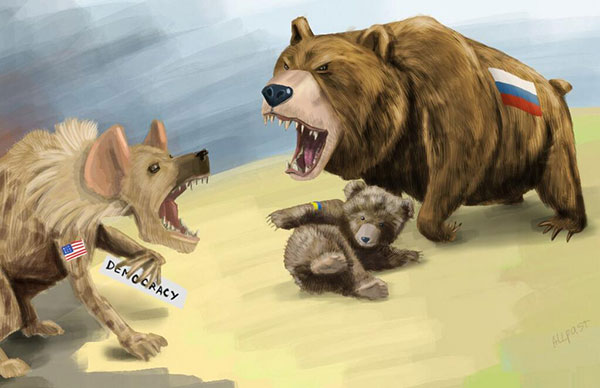Медведь охраняет медвеженка